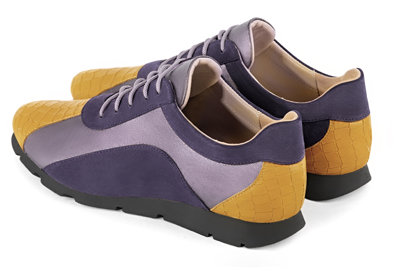Mustard yellow and lilac purple women's open back shoes. Round toe. Flat rubber soles. Rear view - Florence KOOIJMAN